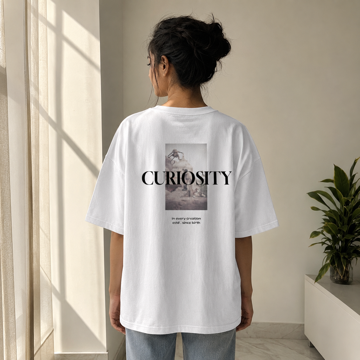 Curiosity Oversized Tee back graphic oversized T-shirt by Wondering Minds