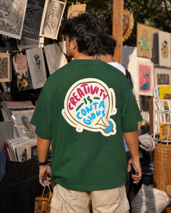 Creativity Is Contagious Oversized Tee back graphic oversized T-shirt by Wondering Minds