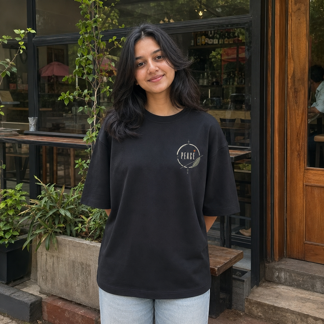 Peace is a Practice Oversized Tee front artwork and fit by Wondering Minds